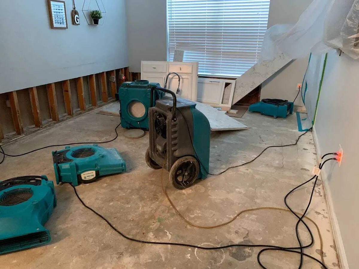 Dehumidifier in flood-cut room for Water Damage Restoration in Sawmills